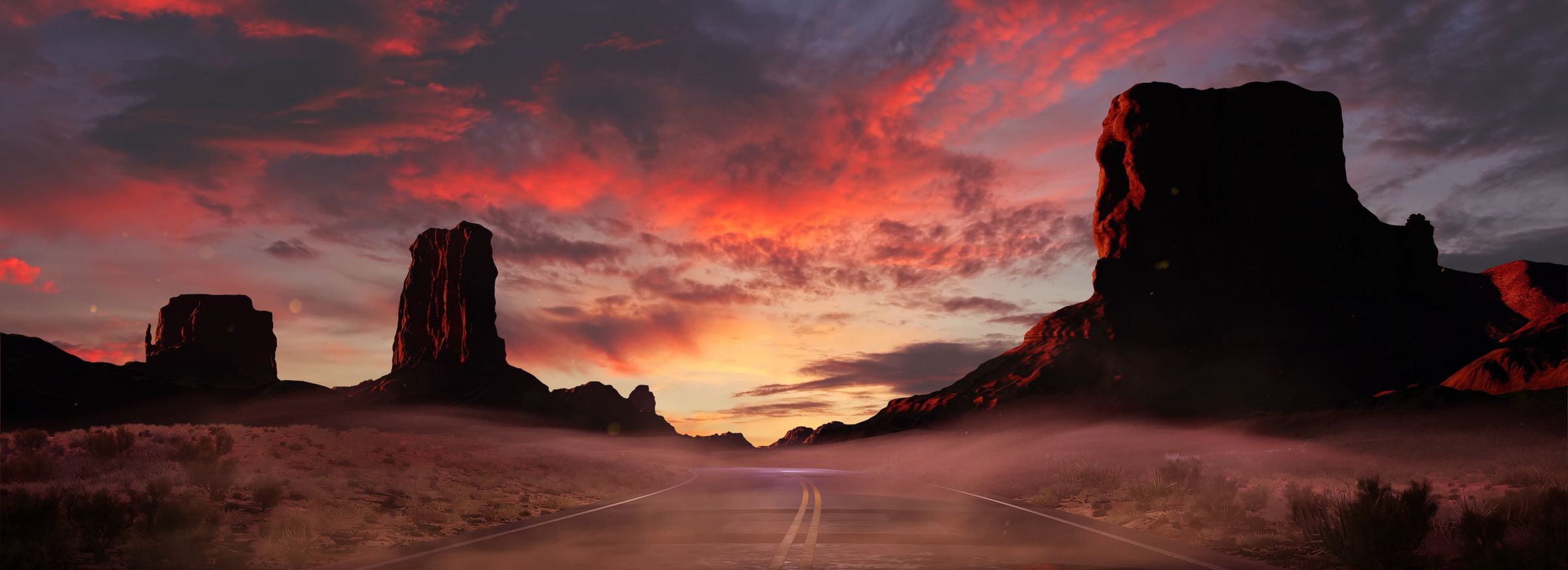 The same desert highway under a burning sunset