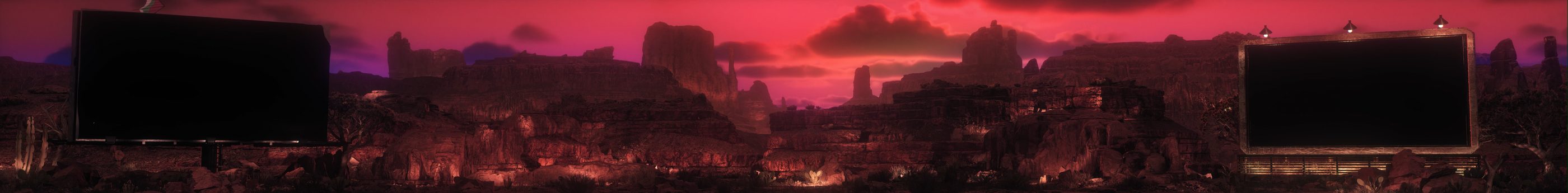 The canyon at dusk under a deep pink sky